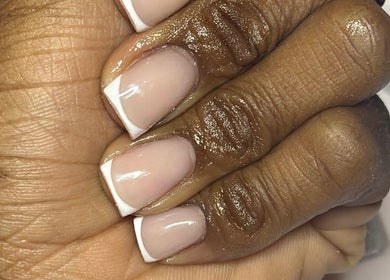 Elegant French nail manicure at Nails_bylauryn, Bedford, England, GB, showcasing glossy finish.