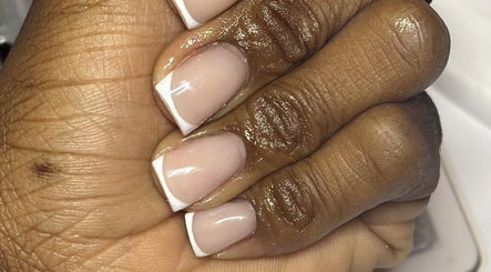Elegant French nail manicure at Nails_bylauryn, Bedford, England, GB, showcasing glossy finish.