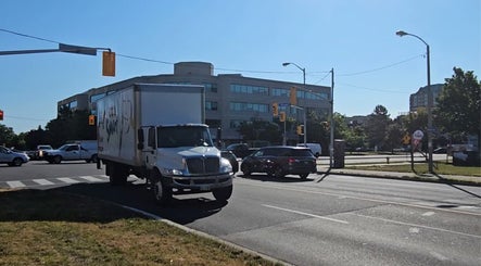 City view near Medi Hair Loss & Scalp Clinic Toronto on a busy street in Toronto, Ontario, CA.