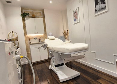 Luxurious treatment room at SkinWell Aesthetics Boutique in London, England, GB with modern equipment.