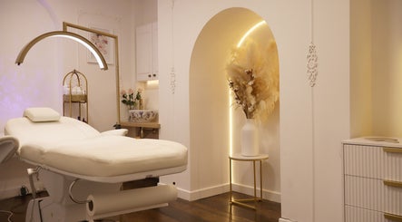 Elegant treatment room at Skin Well Aesthetics Boutique, London, England, GB, featuring a luxurious spa bed.