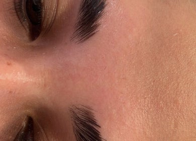 Close-up of expertly shaped eyebrows at Browsbybre, Upland, California, US enhancing natural beauty.