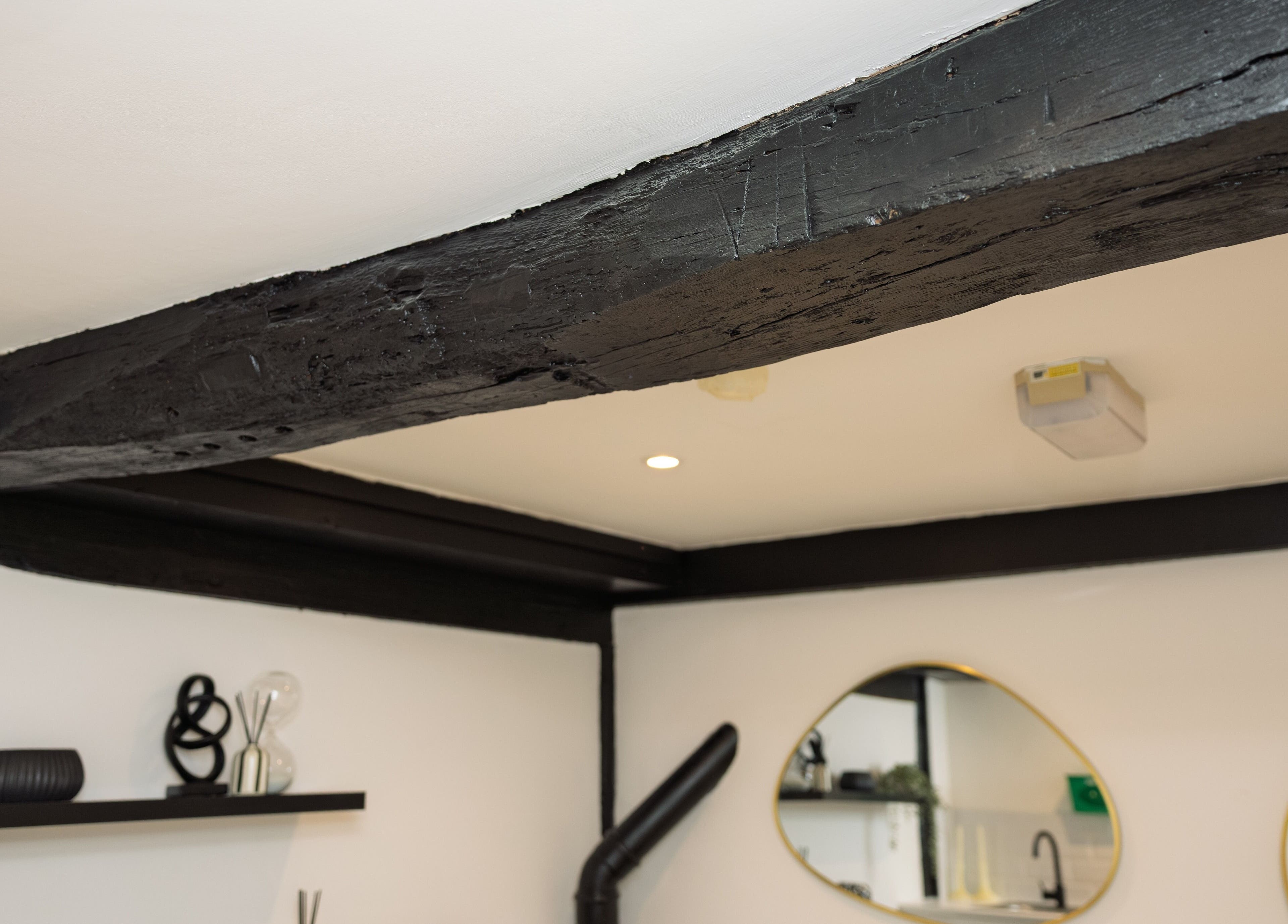 Stylish interior with modern black beams at The Sigma Clinic, Chelmsford, England, GB.