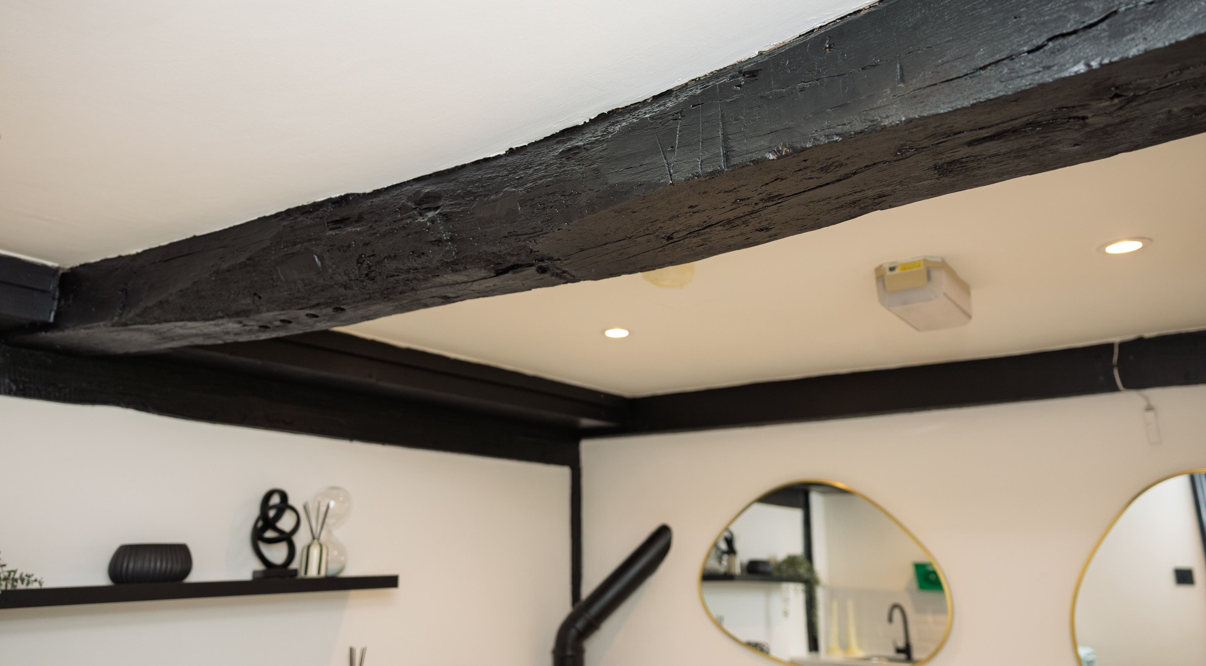 Stylish interior with modern black beams at The Sigma Clinic, Chelmsford, England, GB.