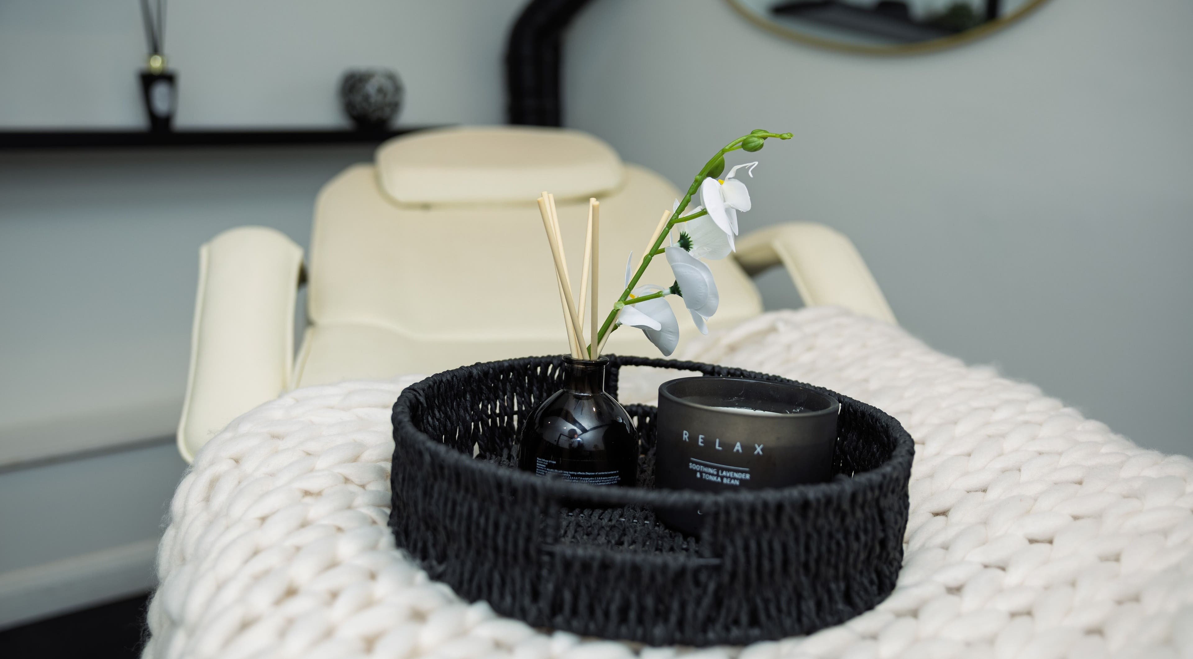 Relaxation setup at The Sigma Clinic, Chelmsford, England, GB with a spa bed and calming decor.