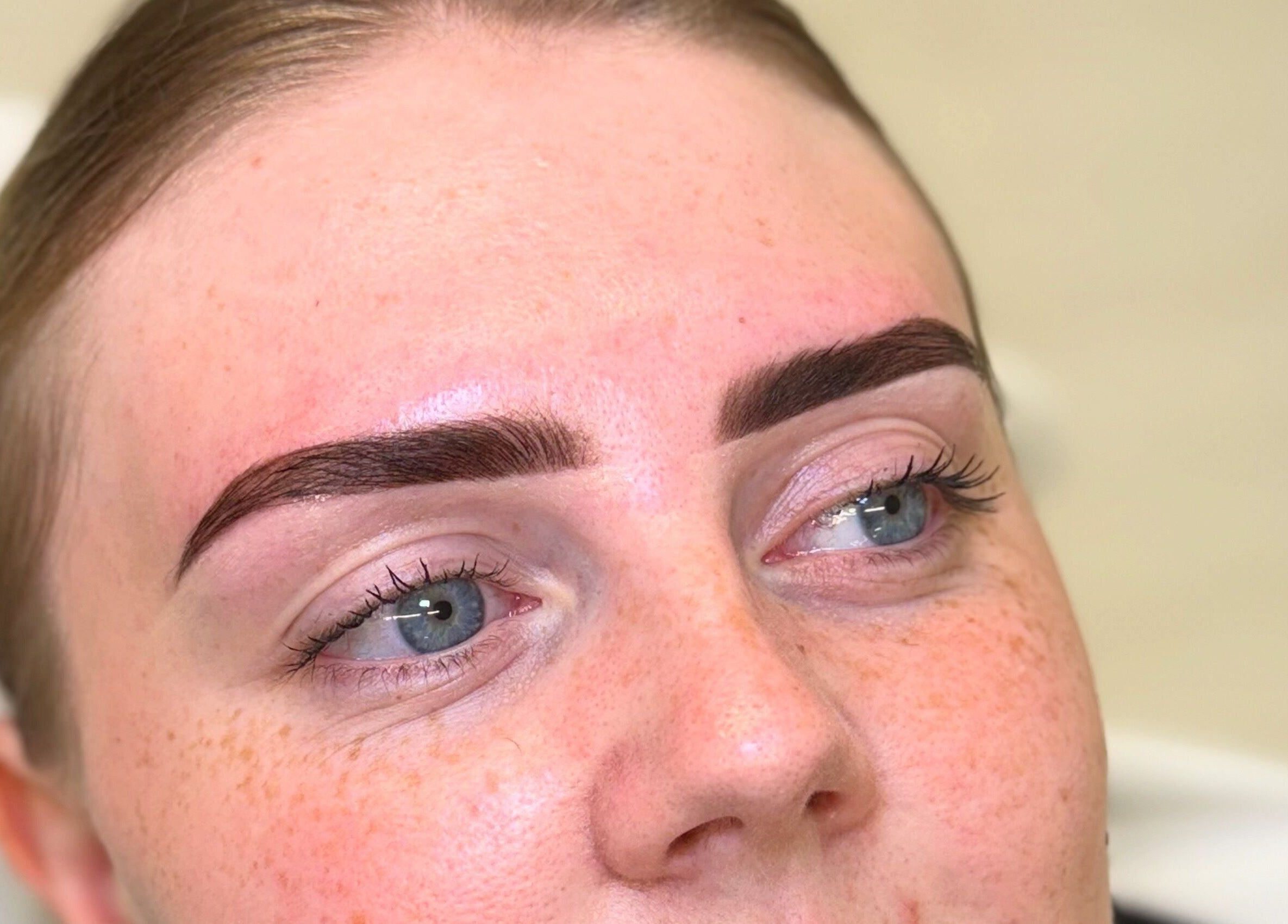 Perfectly groomed eyebrows at Chloë Jane Aesthetics, Farleigh Wallop, England, GB showcase expert artistry.