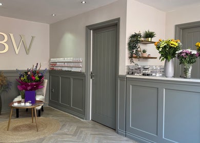 Ann’s Nails and Beauty in Ruddington, England, GB features elegant interiors with flowers and stylish decor.