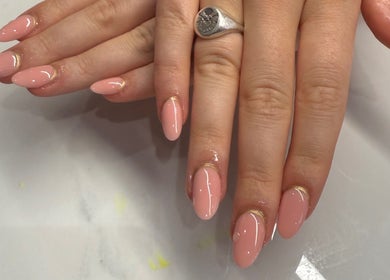 Stylish pink manicured nails at Ann’s Nails and Beauty in Ruddington, England, GB.