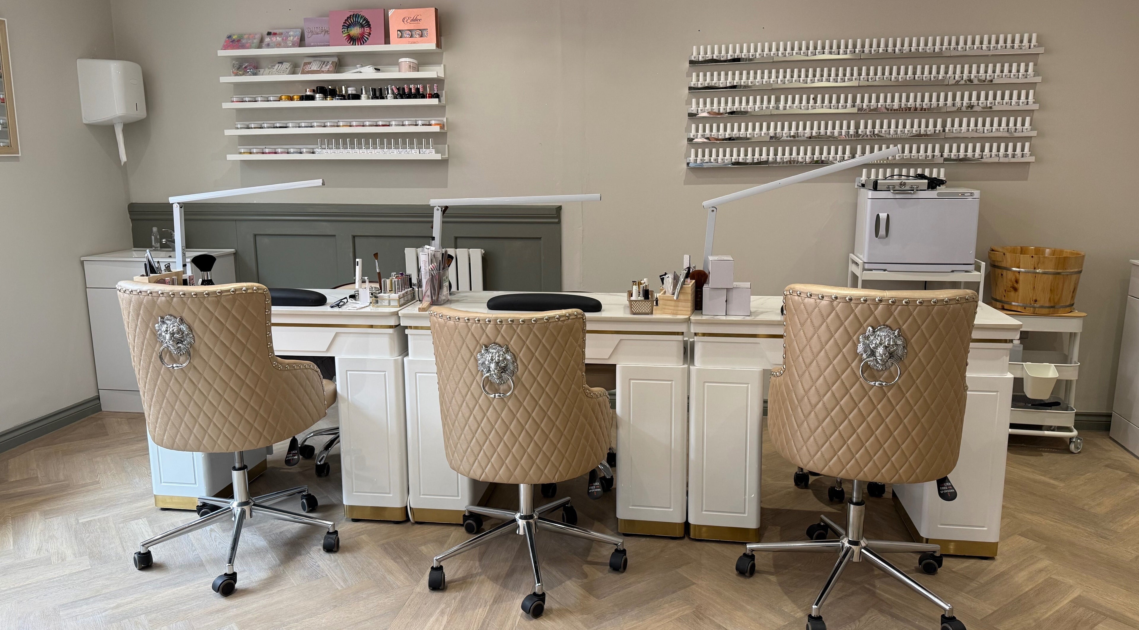 Elegant nail stations at Ann’s Nails and Beauty in Ruddington, England, GB with plush seating.