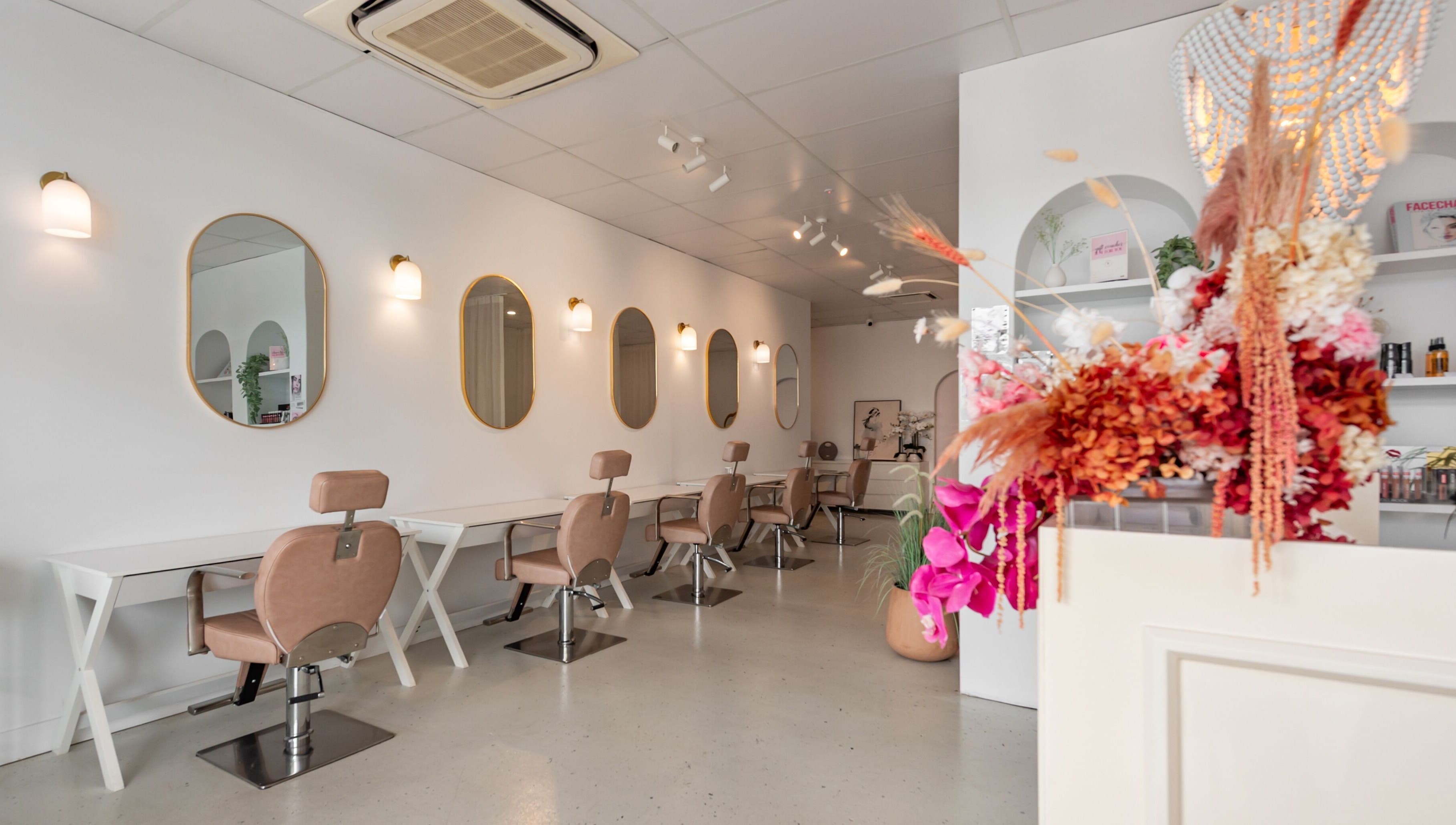 Elegant salon interior at Your Canvas in Hermit Park, Queensland, AU with chic decor and stylish styling chairs.