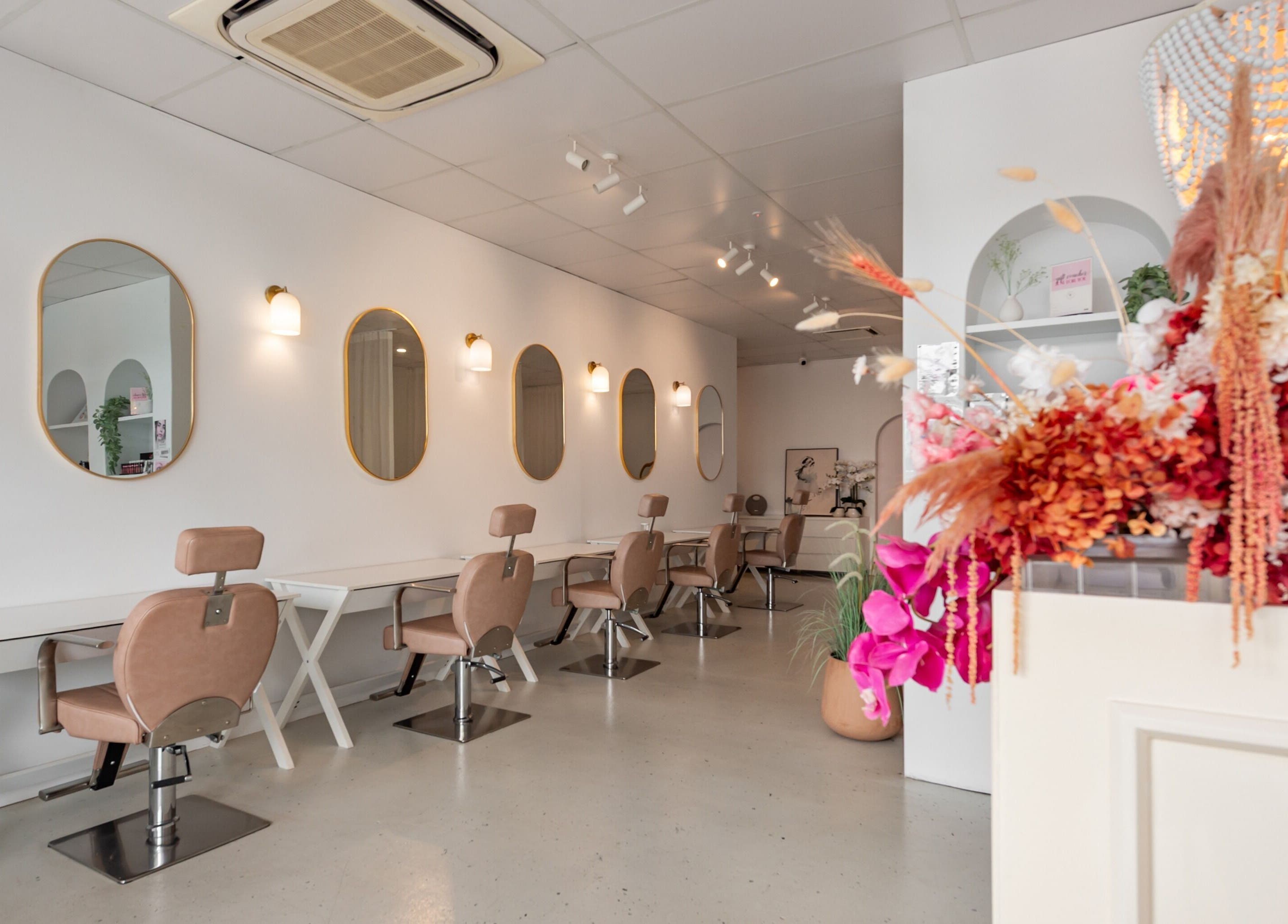 Elegant salon interior at Your Canvas in Hermit Park, Queensland, AU with chic decor and stylish styling chairs.