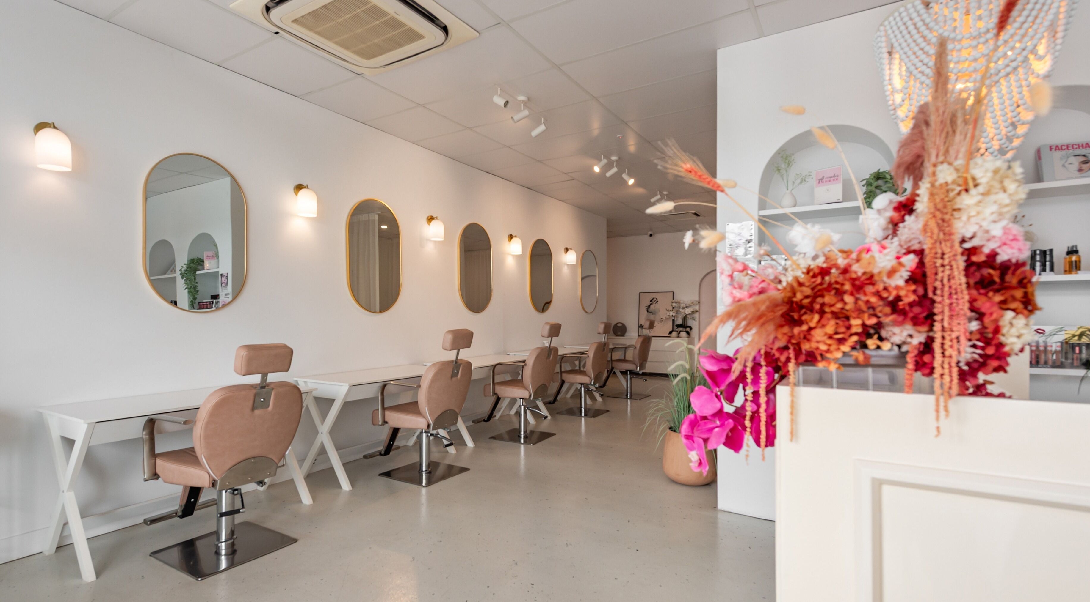 Elegant salon interior at Your Canvas in Hermit Park, Queensland, AU with chic decor and stylish styling chairs.