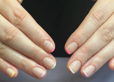 Colorful French nails at The Harrogate Nail Artist, located in Harrogate, England, GB.