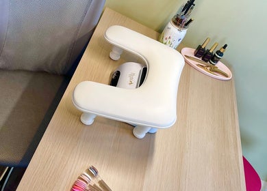 Manicure station at The Harrogate Nail Artist in Harrogate, England, GB featuring tools and nail colors.