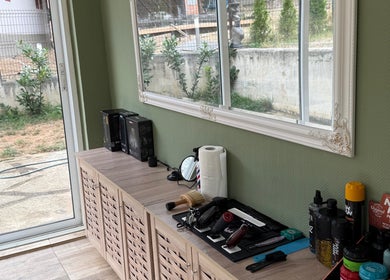 Grooming tools on a wooden counter at IndCuts21, Pravets, Sofiyska Oblast, BG.