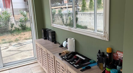 Grooming tools on a wooden counter at IndCuts21, Pravets, Sofiyska Oblast, BG.