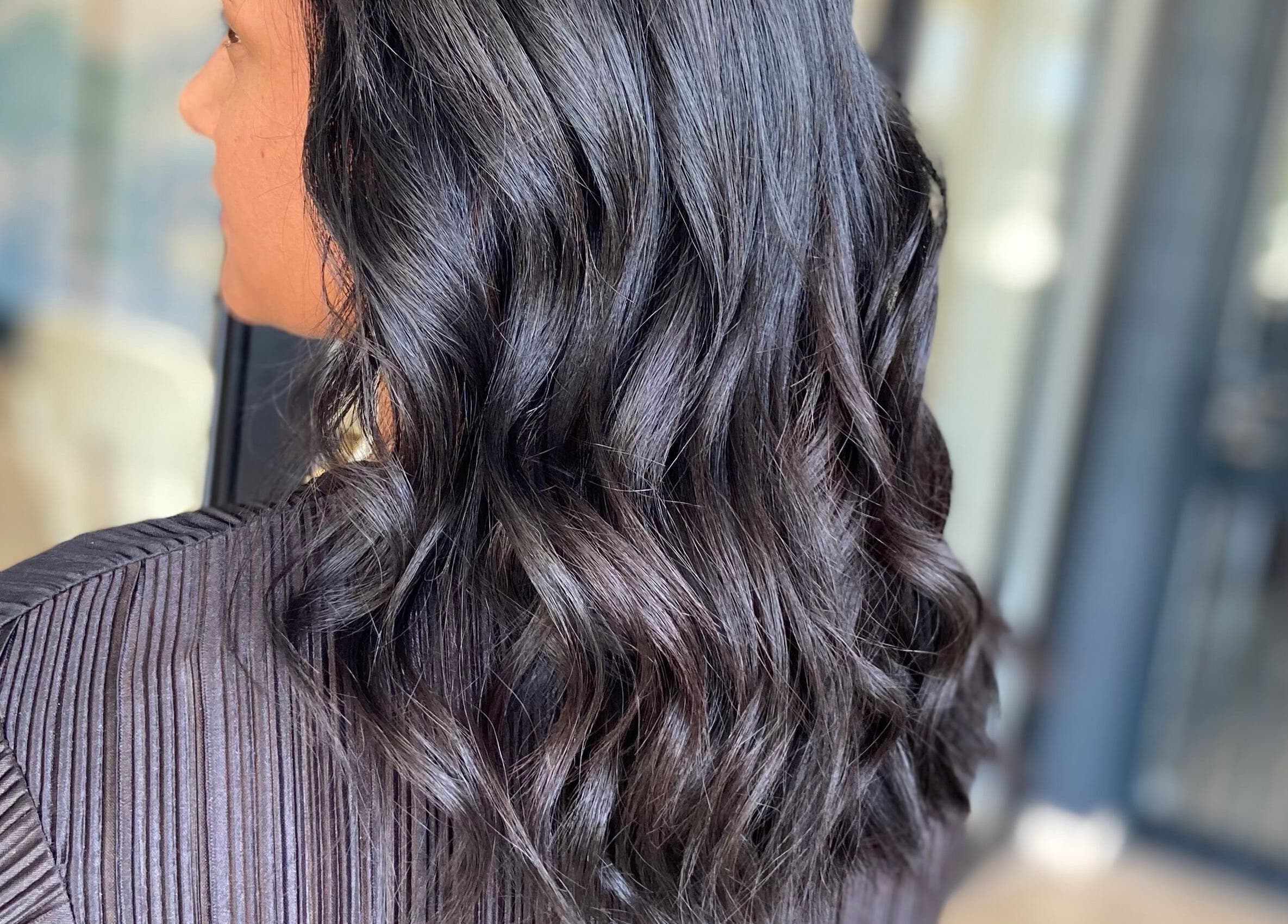 Elegant wavy hairstyle at Nobs Hair Extensions Studio, Johannesburg, Gauteng, ZA.