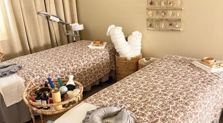 Tranquil therapy room at Moonme Spa, Newport Beach, California, US with twin treatment beds.