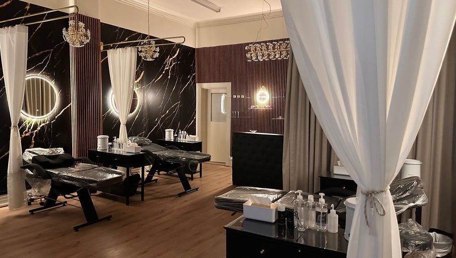 Luxurious interior of Brow & Lash Queen in Melbourne, Victoria, AU featuring chic decor and beauty stations.
