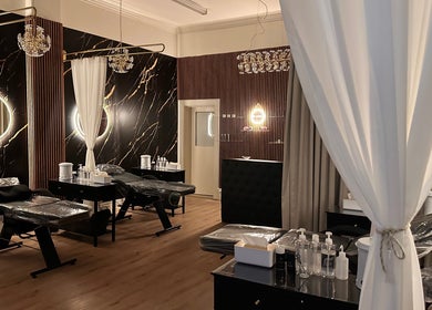 Luxurious interior of Brow & Lash Queen in Melbourne, Victoria, AU featuring chic decor and beauty stations.