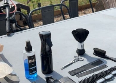 Professional barber tools displayed at CutByOC, Saltdean, England, GB, showcasing a premium service setup.