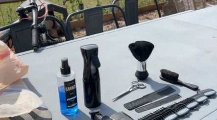 Professional barber tools displayed at CutByOC, Saltdean, England, GB, showcasing a premium service setup.