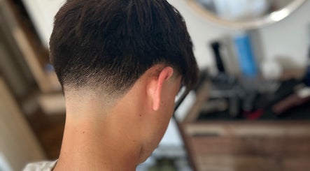 Close-up of a stylish fade haircut at CutByOC in Saltdean, England, GB.