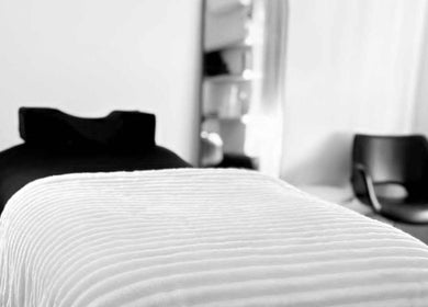 A tranquil treatment room at BREE MONIQUE'S BEAUTY & CO, Emerald, Queensland, AU, featuring a cozy bed.