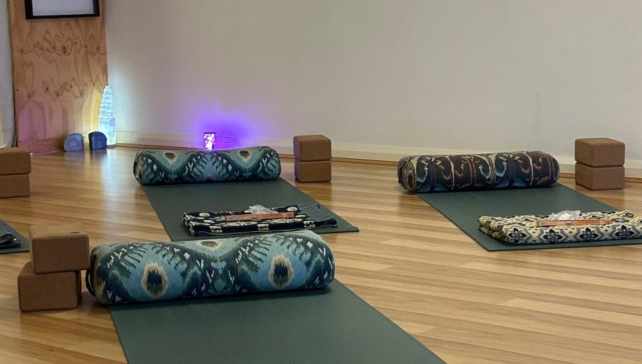 Peaceful yoga setup at Butterfly Energy in Duncraig, Western Australia, AU with mats, bolsters, and soft lighting.
