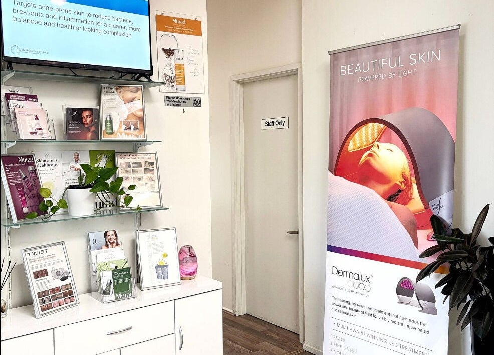 Interior of Advanced Skin and Laser, Mount Eliza, Victoria, AU showcasing skincare products and treatment poster.
