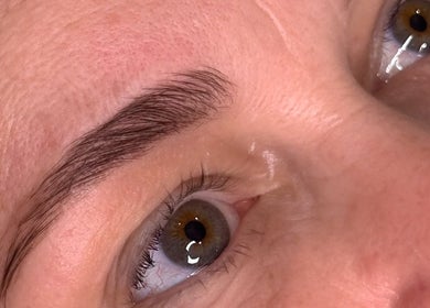 Perfectly shaped eyebrows at AC Brow & Beauty in Wheeler Heights, New South Wales, AU enhance facial features.