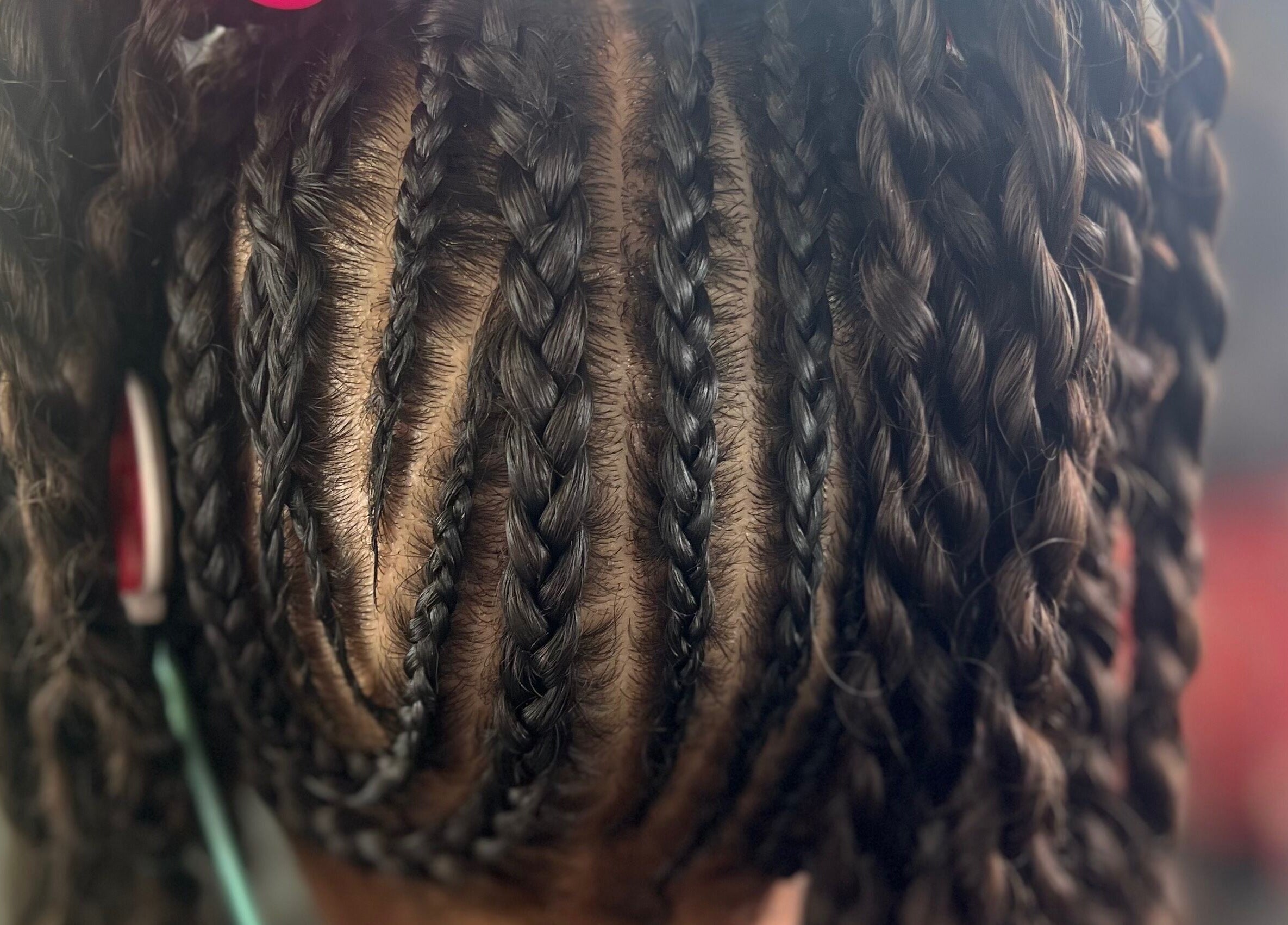 Intricate braids at Undefined Beauty, Tulsa, Oklahoma, US.