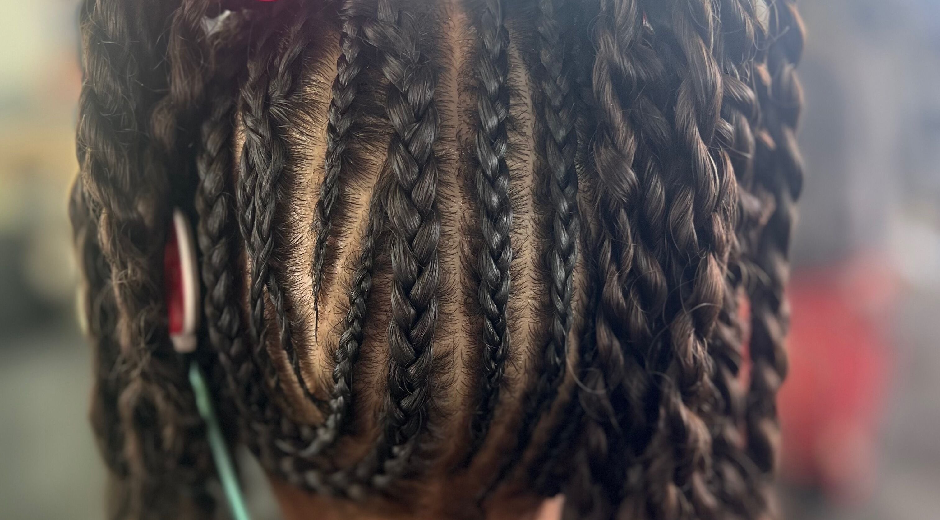 Intricate braids at Undefined Beauty, Tulsa, Oklahoma, US.
