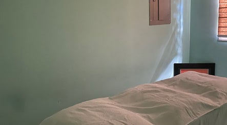 Serene massage room at Subrina’s Golden Touch therapeutic Massage in Kingston, St. Andrew Parish, JM.