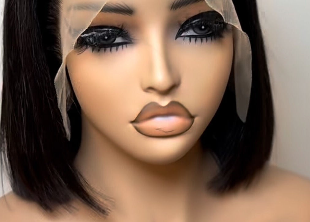 Elegant mannequin display at SS HAIR STUDIO 2020 in Rustenburg, North West, ZA showcasing makeup style.