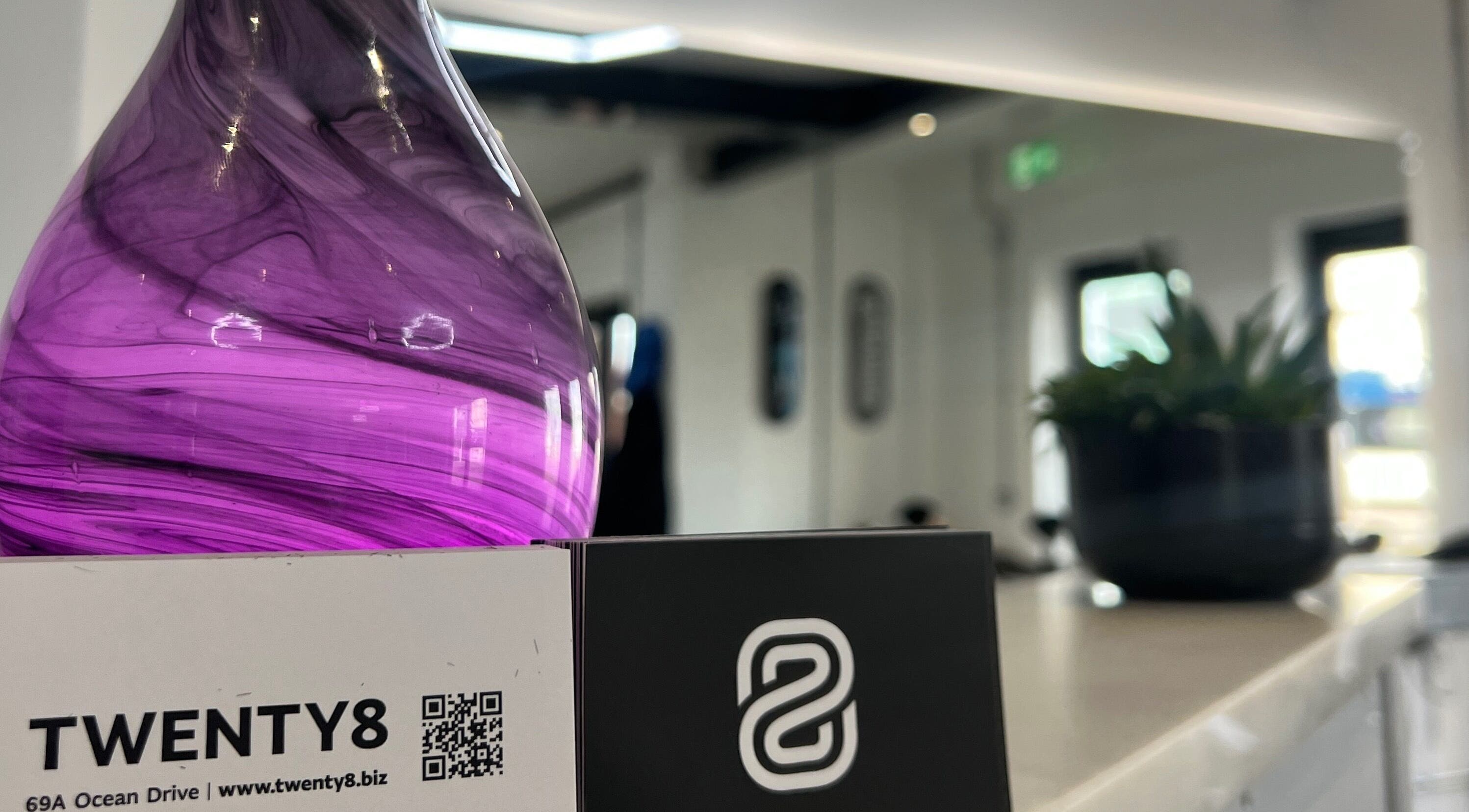 Elegant violet glass decor at Twenty8, Edinburgh, Scotland, GB enhancing the modern salon's tranquil ambiance.