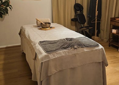 Relaxing massage room at Joro Studio, Melbourne, Victoria, AU, featuring a massage table and soothing decor.