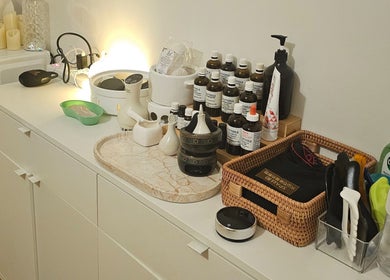 Therapy tools and oils at Joro Studio, Melbourne, Victoria, AU, on a sleek white counter.