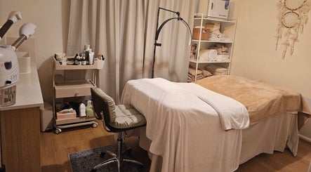 Joro Studio treatment room with spa bed and supplies in Melbourne, Victoria, AU, creating a relaxing ambiance.