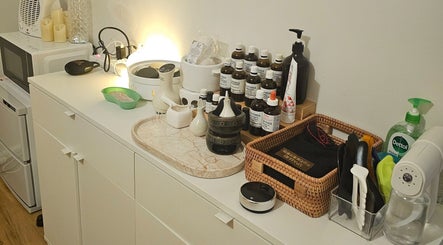 Joro Studio's beauty essentials at Melbourne, Victoria, AU elegantly organized on a pristine white countertop.