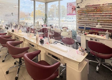 Modern interior of Vivid Nails And Beauty, Lyneham, Australian Capital Territory, AU, showcasing chic nail stations.