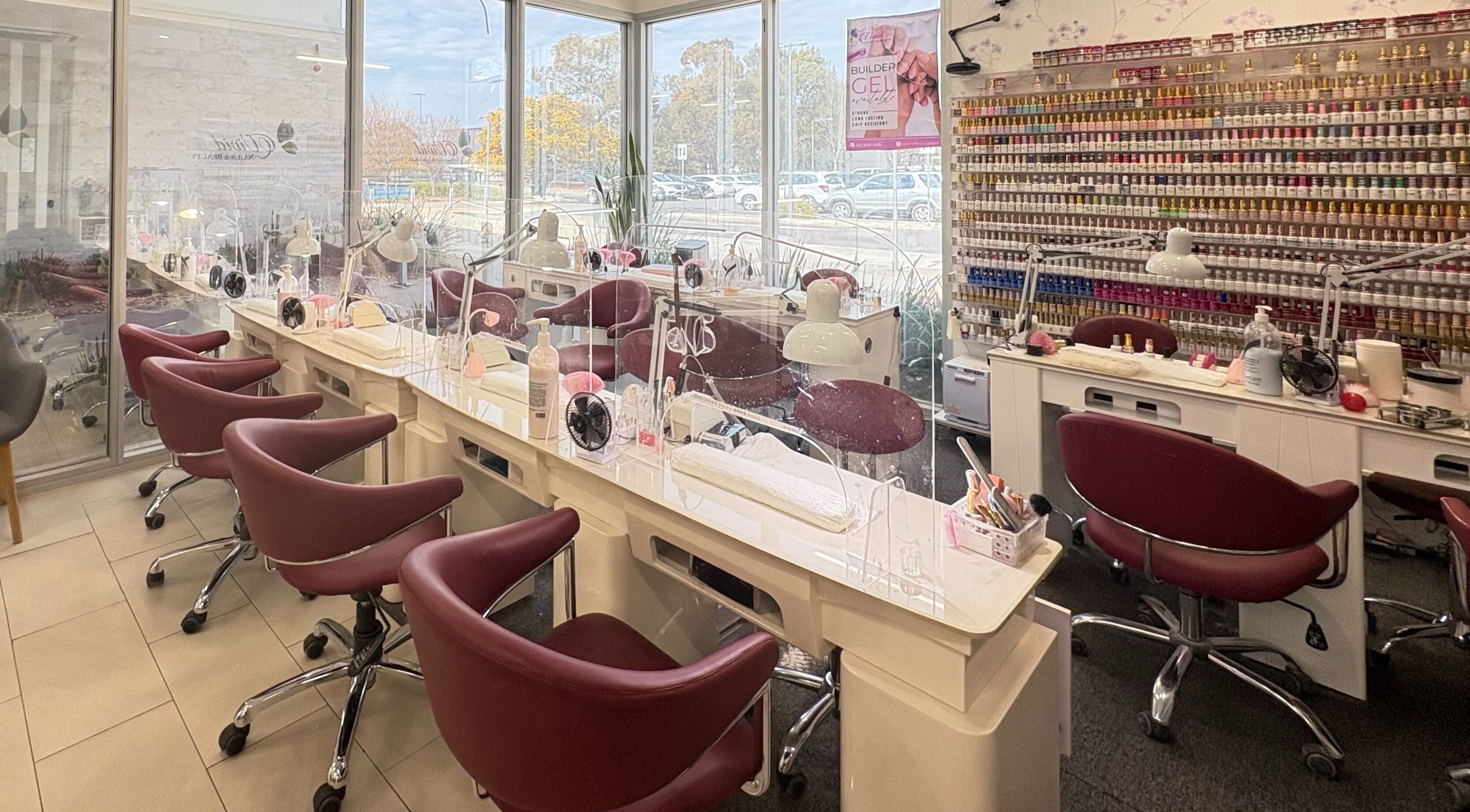 Modern interior of Vivid Nails And Beauty, Lyneham, Australian Capital Territory, AU, showcasing chic nail stations.
