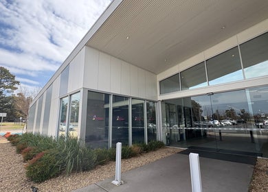 Modern entrance of Vivid Nails And Beauty in Lyneham, Australian Capital Territory, AU, showcasing sleek design.