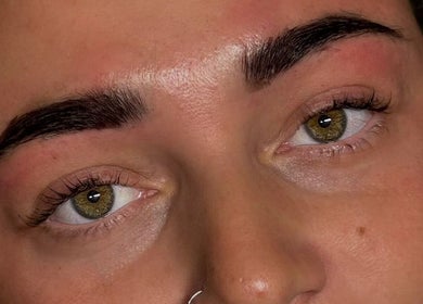 Close-up of perfectly groomed eyebrows at Bratz Beauty, Ossett, England, GB showcasing expert styling.