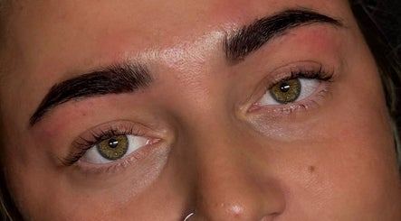 Close-up of perfectly groomed eyebrows at Bratz Beauty, Ossett, England, GB showcasing expert styling.