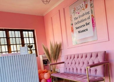 Chic waiting area with pink decor at KM Beauty Lounge, Randburg, Gauteng, ZA.