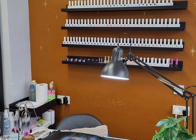 Nail polish display at Boho Glow Nails, Launceston, England, GB, showing vibrant colors.