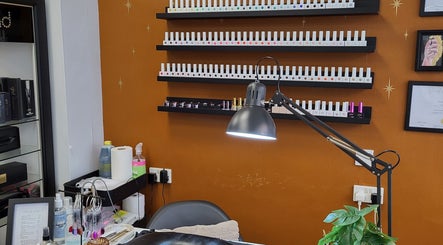 Nail polish display at Boho Glow Nails, Launceston, England, GB, showing vibrant colors.