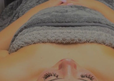 Relaxing spa treatment at Rebecca Louise Beauty, Culcheth, England, GB, with warm towels and soothing ambiance.