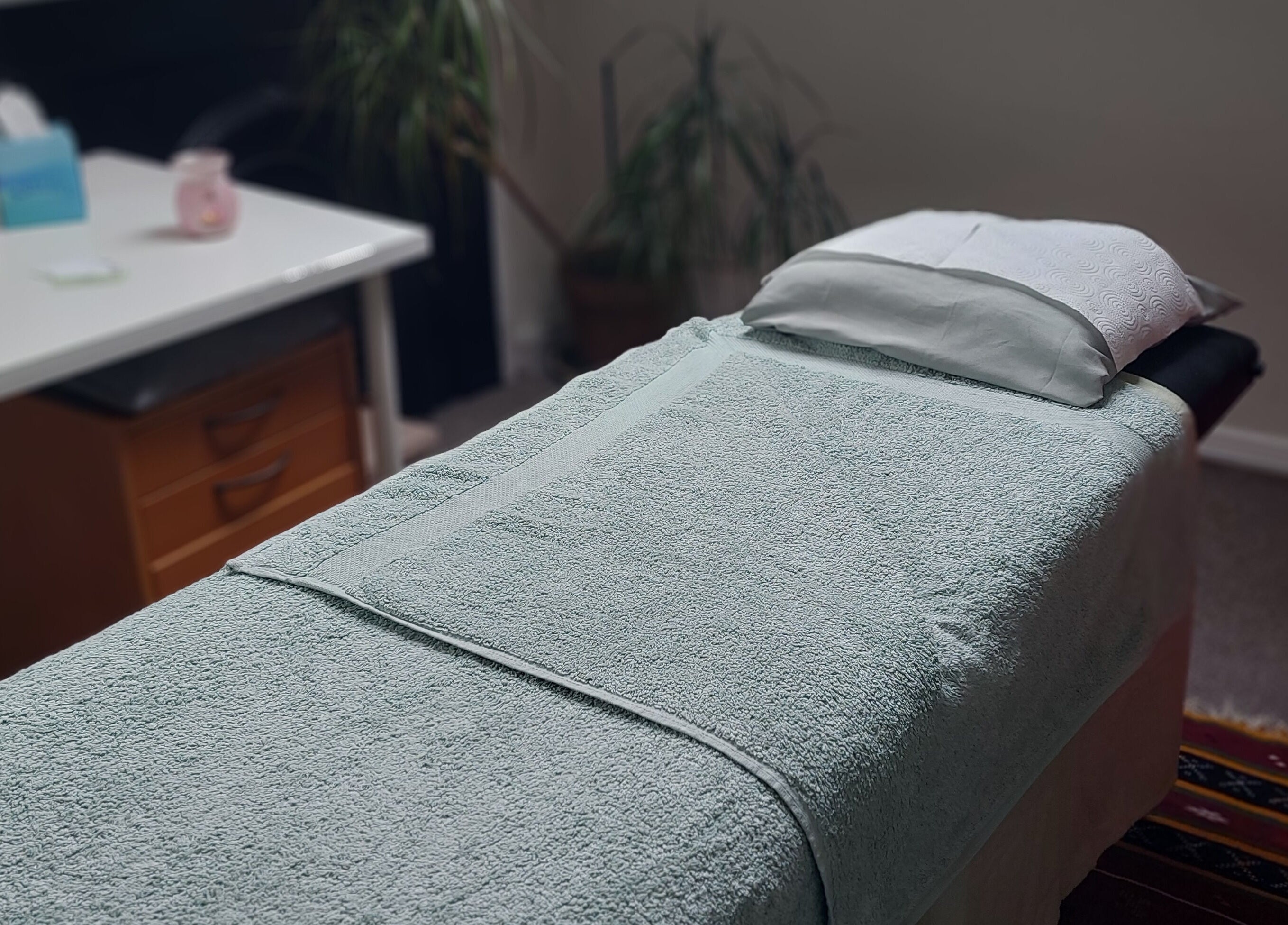Relaxing massage table at City Zen Sanctuary, Edinburgh, Scotland, GB, inviting for tranquil spa experiences.